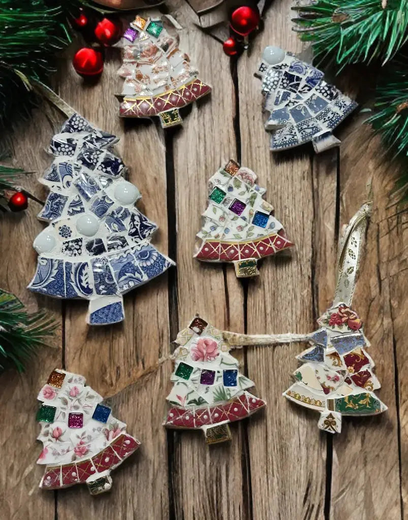 Assorted handmade upcycled ceramic mosaic Christmas tree ornaments in various colours and vintage patterns