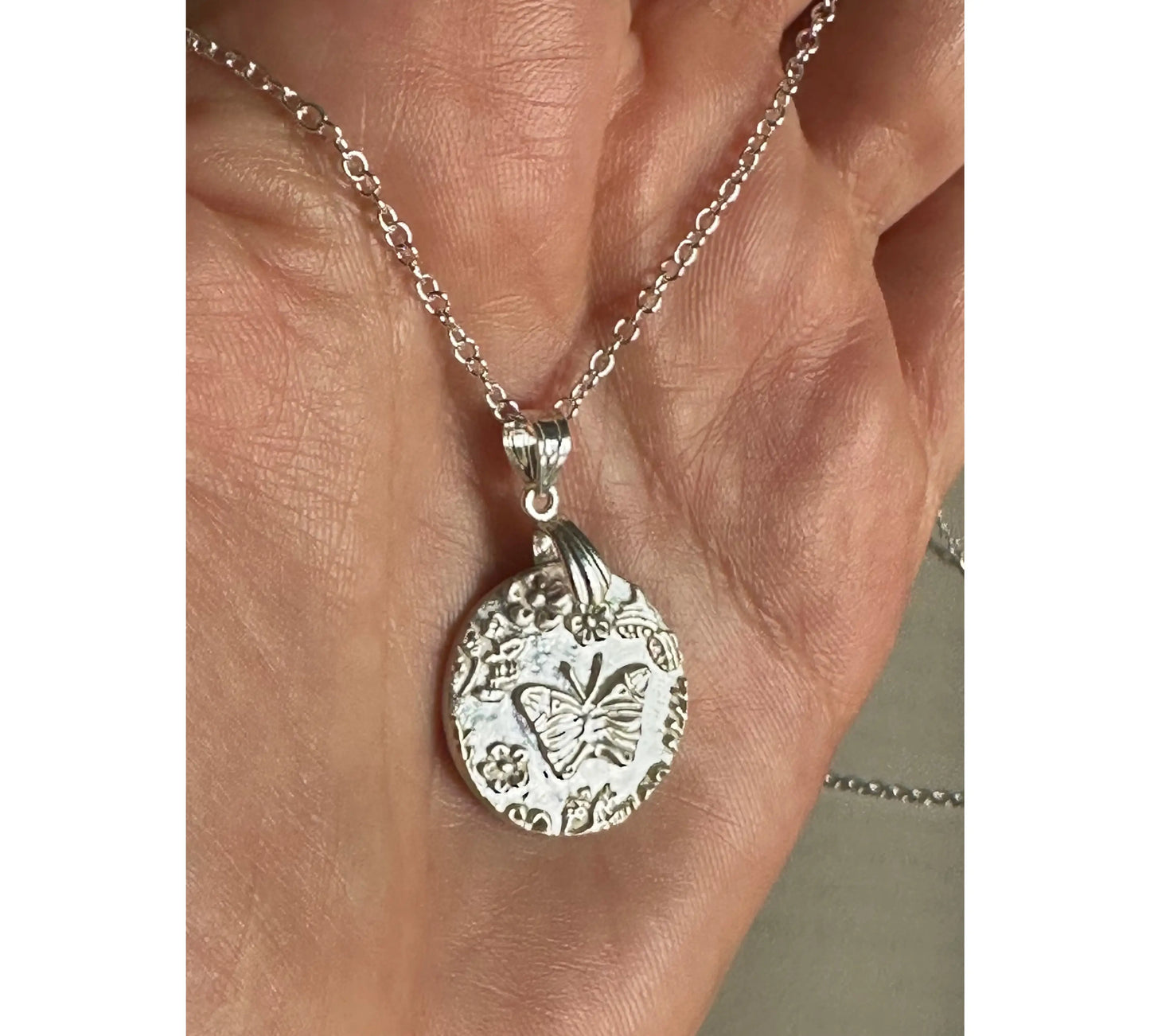 Handmade Silver Butterfly and Flowers Necklace- Sustainable handmade silver jewelry by The Big Little Shop in Dubai