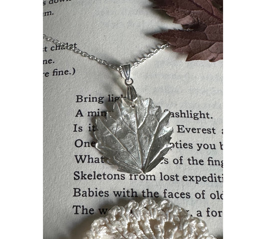 Handmade Silver Hibiscus Leaf Necklace- Sustainable handmade silver jewelry by The Big Little Shop in Dubai